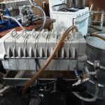 Filter press machine used to remove impurities from maple syrup in the final step before bottling at Dodge's Sugar Shack.